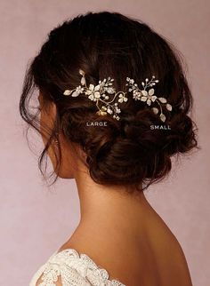 the back of a woman's head wearing a bridal hair comb