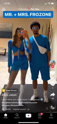 a man and woman in blue outfits taking a selfie on their cell phone with the caption mr + mrs frozone