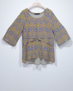 From Tena Durrani's 2016 exhibit. This is a rare piece from the designer's quality collection. A tulip shalwar paired with a short shirt, this piece is contemporary, and a style which many designers continue to carry today. 2 pieces. Spring Ikat Print Long Sleeve Tops, Spring Long Sleeve Ikat Print Tops, Traditional Spring Workwear Tops, Bohemian Ikat Print Tops For Festive Occasions, Bohemian Tops With Ikat Print For Festive Occasions, Festive Long Sleeve Ikat Print Tops, Festive Ikat Print Top, Traditional Ikat Print Sets For Spring, Spring Festival Printed Blouse