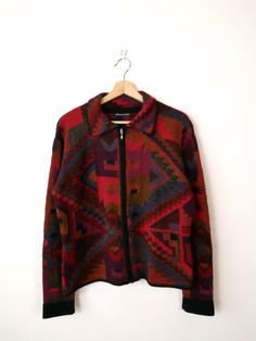 Vintage Alpaca Hand Knit Geometric Zip up Sweater Cardigan. Measurements Length: 23" Armpit to armpit: 21" Armpit to end of sleeve: 19 1/2" Condition: Gently used. There's no stains or holes. Good condition.  ※Please read the policy before you purchase※ Retro Knitted Outerwear For Fall, Winter Outerwear With Fair Isle Pattern For Layering, Retro Winter Outerwear For Layering, Winter Fair Isle Pattern Outerwear For Layering, Retro Winter Layering Outerwear, Red Fair Isle Long Sleeve Outerwear, Retro Knit Long-sleeve Outerwear, Fitted Wool Outerwear With Jacquard Knit, Fitted Wool Jacquard Knit Outerwear