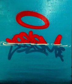 graffiti on the side of a blue wall that says o'doon written in red