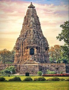 a large stone structure in the middle of a park