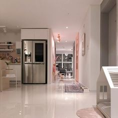 the kitchen is clean and ready to be used as a living room or dining area