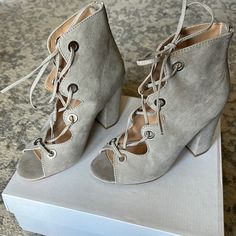 Brand New Express Bootie/Heel Size 7. Grey/Taupe Color. Zip Up Back And Lace Up Front. Very Comfortable! I Love These Shoes So Much I Bought Two Pairs. Luckily My First Pair Are Still In Great Condition. Don’t Need The Shoes, Need The Closet Space The Color And Style Make Them So Versatile They Go With Everything! Casual Beige Lace-up Heels, Gray Round Toe Heels For Spring, Gray Spring Heels With Round Toe, Spring Gray Round Toe Heels, Casual Gray Heels For Spring, Gray Medium Width Heels For Spring, Spring Gray Medium Width Heels, Closet Space, Taupe Color