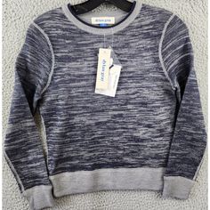 Dylan Gray Heather Knit Pullover Sweater Boys M Navy Gray Crewneck Wool Blend Dylan Gray Heather Knit Pullover Sweater Boys M Navy Gray Crewneck Wool Blend Retail $69.00 This Dylan Gray Heather Knit Pullover Sweater Is Perfect For Any Young Boy Who Loves To Travel Or Engage In Casual Activities. The Sweater Features A Crew Neck And Long Sleeves, Making It Ideal For Cooler Weather During Fall, Winter, Or Spring. The Sweater Is Made Of A Blended Fabric Of Wool And Acrylic, Making It Both Breathabl Gray Knit Crew Neck Sweater, Casual Gray Outdoor Sweater, Urban Gray Crew Neck Sweater, Boy Grey Sweater, Gray Moisture-wicking Sweatshirt, Gray Crewneck, Boy M, Grey Crewneck, Navy Gray