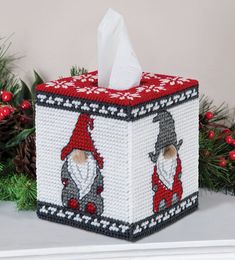 a tissue box decorated with an image of a gnome