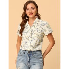 This lovely shirt features a notched lapel collar, a V neckline, short sleeves, and a button-up front, all adorned with a beautiful floral print. It's perfect for any casual occasion, be it a day out with friends or a relaxing weekend getaway. You can pair it with shorts for a laid-back look that's both comfortable and stylish. To keep it in top condition, just machine wash it in cold water with like colors. The model is wearing an X-Small. Enjoy your new favorite shirt! Short Sleeve Floral Print Shirt For Work, Floral Print Short Sleeve Work Shirt, Workwear Floral Print Short Sleeve Shirt, Summer Collared Blouse With Button Closure, Spring Short Sleeve Shirt With Collared Neckline, Spring Short Sleeve Collared Shirt With Button Closure, Spring Short Sleeve Shirt With Button Closure, Summer Blouse With Collar And Button Closure, Spring Top With Johnny Collar And Button Closure