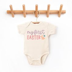 The perfect bodysuit for your perfect baby! These short sleeve bodysuits have 3 snap closure and double needle ribbed binding on neck, shoulders, sleeves, and leg openings. Machine wash cold, inside out. Air dry or tumble dry low. Cricut Baby Onesie Easter, Spring Cotton Bodysuit For First Birthday, First Birthday Spring Cotton Bodysuit, First Birthday Spring Onesie With Short Sleeves, Spring Playtime Letter Print Bodysuit, Spring Playtime Onesie With Letter Print, Spring Birthday Onesie With Short Sleeves, Cute Letter Print Bodysuit For Spring, Spring Birthday Short Sleeve Onesie