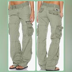 Multi- Pocket Cargo Pants With Zipper Accents. Measurements: Waist 28” Length 40” Inseam 29” Baggy Mid-rise Cargo Parachute Pants, Mid-rise Outdoor Pants With Pockets, Green Mid-rise Cargo Pants For Streetwear, Green Cargo Pants With Belt Loops For Outdoor Activities, Green Cargo Pants With Belt Loops For Outdoor, Mid-rise Khaki Pants For Streetwear, Sporty Mid-rise Cargo Pants With Pockets, Sporty Mid-rise Cargo Pants, Sporty Mid-rise Cotton Cargo Pants