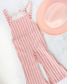 Kellyn Bell Bottom Suspender Jumpsuit - Mauve Stripe - Bailey's Blossoms Spring Fitted Jumpsuits And Rompers With Adjustable Straps, Trendy Spring Jumpsuits And Rompers With Adjustable Straps, Trendy Jumpsuits And Rompers With Adjustable Straps For Spring, Fitted Jumpsuits And Rompers With Adjustable Straps For Spring, Trendy Jumpsuit With Adjustable Straps And Bib Front, Spring Fitted Overalls With Adjustable Straps, Trendy Jumpsuits With Adjustable Straps And Bib Front, Trendy Fitted Overalls With Adjustable Straps, Spring Tie Back Overall Jumpsuits And Rompers