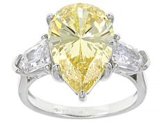 Bella Luce® canary and white diamond simulant 10.19ctw pear and round, rhodium over sterling silver ring. Measures approximately 0.81" L x 0.63" W and is not sizable. Diamond equivalent weight is 6.17ctw. Luxury Yellow Pear-shaped Jewelry, Yellow Pear Shaped Fine Jewelry Rings, Yellow Pear-shaped Fine Jewelry, Pear-shaped Yellow Jewelry With Diamond Accents, Yellow Pear-shaped Jewelry With Diamond Accents, Yellow Pear-shaped Center Stone Jewelry, Yellow Pear-shaped Jewelry With Center Stone, Yellow Pear-shaped Jewelry For Anniversary, Yellow Pear-shaped Diamond Cut Jewelry