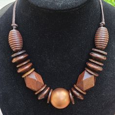 Beautiful Wooden Necklace To Match Your Bohemian Style. Rustic Brown Wooden Beaded Necklaces, Vintage Wooden Beads Necklaces, Brown Wooden Beads Pendant Necklace, Wooden Necklaces, Bohemian Multi-strand Wooden Beaded Necklaces, Vintage Brown Wooden Bead Necklaces, Wooden Bead Jewelry, Pink Pendant Necklace, Red Pendant Necklace