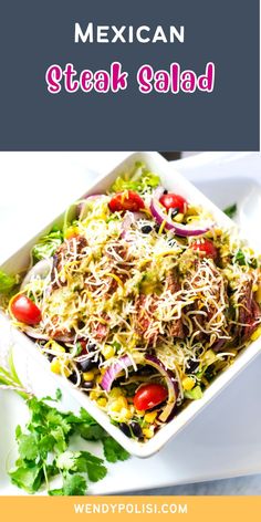 mexican steak salad with shredded cheese and tomatoes in a white bowl on a plate next to cilantro