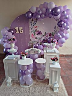 balloons and tables are set up in front of a mirror