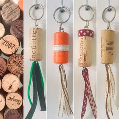 four different types of wine corks hanging from hooks and key chains with ribbons attached to them