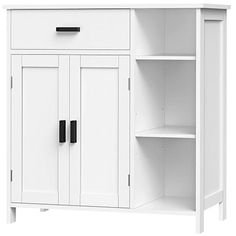 a white cabinet with doors and shelves on the bottom shelf is shown against a white background