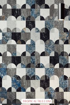 an abstract tile design with black, white and blue colors