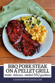 bbq pork steak on a plate with macaroni and cheese