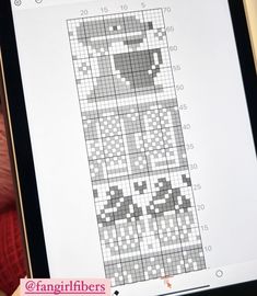 a cross stitch pattern is displayed on an ipad