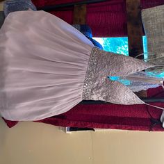 Silver Homecoming Dress. Never Worn. It Is A Size Large (Size 4) Silver Dama Dresses For Quince Cheap, Deployment Homecoming Dresses, Silver Homecoming Dress, Homecoming Dress, Homecoming Dresses, Large Size, Homecoming, Colorful Dresses, Size 4