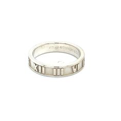 Authentic Tiffany & Co Estate Atlas Ring 5.5 Silver 4 mm TIF425This elegant Authentic Tiffany & Co sterling silver ring is 5.5 inches in size and has a weight of 10 Grams. TRUSTED SELLER SINCE 2002DETAILSRing Size: 5.5Height: 4 mmWeight: 10 GramsMetal: Sterling SilverWe try to present our estate items as best as possible and most have been newly polished some of the Tiffany items may have a natural patina As they are estate silver pieces. Please refer to the pictures as they are the actual items Tiffany Atlas Rings, Tiffany Co Rings, Silver Pieces, Tiffany & Co., Sterling Silver Ring, Silver Ring, Sterling Silver Rings, Patina, Silver Rings