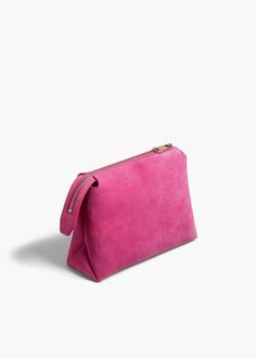 A lightweight pouch shaped by sculptural folds along the sides. The extended zipper closure allows allows for full access to the interior. Modern Evening Pouch With Zipper Closure, Versatile Pouch With Zipper Pocket, Modern Evening Clutch With Zipper Pocket, Modern Evening Zipper Pouch, Modern Evening Cosmetic Bag, Evening Zipper Pouch Cosmetic Bag, Modern Zipper Pouch Cosmetic Bag, Leather Outerwear, Belt Accessories