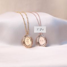 "If you choose the \"Picture\" option, we'll put the image on the locket.  Use the \"contact shop owner\" button to send us the picture, or you can email it to hoiaucraft@outlook.com. HOW TO ORDER? All three sides can be customized.  Specify which side, Chain Type you prefer.  (Just accept one picture) For example: Side 1: Rose flower Side 2: Blank Side 3: Picture Box chain ♥ D E T A I L S ♥ ---Locket Size: 23mm * 30mm ---Come with Individual Gift Box. READY TO GIFT. ---All items are handmade with love, Custom items do take a little extra time to create. Our turn around time is about 5-10 business days. ♥ TIPS FOR TAKE GOOD CARE ♥ --Keep it in a dry place. Please take it off before bathing, exercising, swimming. --Don't wear it in the pools, the ocean or in hot tubs. --Keep perfume,sunscre Oval Locket Necklaces For Mother's Day, Mother's Day Oval Locket Necklaces, Oval Locket Necklace For Personalized Gifts, Rose Gold Flower Pendant Locket Necklace Gift, Oval Locket Necklace With Engraving Option, Rose Gold Oval Locket Necklace, Oval Pendant Locket Necklace With Engraving Option As Gift, Engraved Oval Pendant Locket Necklace For Mother's Day, Personalized Rose Gold Oval Pendant Locket Necklace