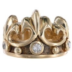 This ring features a captivating crown design adorned with sparkling diamonds. Perfect for adding a touch of regal charm to any ensemble. Treat yourself or a loved one to this luxurious statement piece today  Material: 18K Yellow Gold Weight: 24.7g Ring Size: 5.75 Diamonds: 1 = 0.17Ctw 2 x 0.06Ctw = 0.12Ctw Color And Clarity: H/I1 Total Carat Weight: 0.29Ctw Head: 16.3 mm Shank: 9.23 mm  For more of our jewelry products, please visit our shop 777jewelryLA  Free shipping on all orders within USA. Luxury Rings With Crown Design, Luxury Diamond Rings With Crown Design, Luxury Crown Diamond Ring, Luxury Diamond Crown Ring, Luxury Crown Design Rings, Luxury Yellow Gold Crown Design Rings, Luxury Yellow Gold Ring With Crown Design, Real Gold Jewelry, Diamond Crown