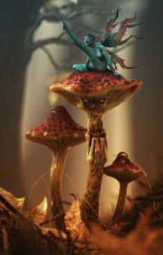 a fairy sitting on top of a mushroom with her arms outstretched and legs spread out