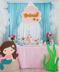 a little mermaid birthday party with balloons and decorations