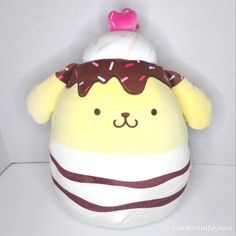 a stuffed animal with donuts on it's head