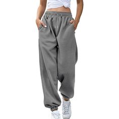 Women High Waisted Sweatpants Joggers Drawstring Athletic Pants With Pockets are the ideal fusion of fashion and coziness. These functional pants are made to move with you, giving you unrestricted freedom to run, jump, and stretch. They are suitable for the entire day because of the smooth, breathable fabric. These jogger pants are a stylish statement that can be dressed up or down thanks to their striking hues and modern style. Specifications: Fabric Type: Cotton, polyester Care Instructions: Baggy Full-length Drawstring Sweatpants, Baggy Drawstring Pants For Winter, Baggy Solid Color Leisure Bottoms, Trendy Baggy Joggers With Drawstring, Baggy Leisure Bottoms, Full-length Leisure Pants With Pockets, Full Length Leisure Pants With Pockets, Leisure Full-length Pants With Pockets, Winter Baggy Pants With Drawstring