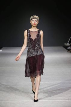 As seen Vancouver Fashion week FW17. See the link below for the full runway show. https://www.youtube.com/watch?v=TxGVAwJFCOo&t=13s This Shimmy with an irresistible flapper look dress is embellished with glass beads and sequinces that swirls sparkles in the moonlight! The illusion neckline and back of the dress is see through. There is an invisible zipper at the side seam. A beautiful drop waist art deco hand beading accents your darling waistline as gathered soft tulle hangs gracefully, while p 20s Dresses For Women, Downton Abbey Day Dress, 1920s Sleeveless Party Dress, Sleeveless Art Deco Flapper Evening Dress, Art Deco Sleeveless Flapper Evening Dress, Art Deco Embellished Fitted Dress, Gatsby Style Sleeveless Flapper Dress For Gala, Art Deco Embellished Sleeveless Dress, Sleeveless Art Deco Embellished Dress