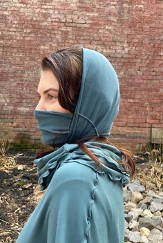 the SOLSTICE is our cozy bamboo neck warmer face cover headscarf or hood known by so many names + uses balacava bally gaiter neckerchief comforting + convenient multifunctional neck and headwear gently shaped to hold securely as a face cover long enough to fold over for double layer fold back over the head for a balaclava achieve a hair cover saharine or hood sustainable breathable and comforting ideal for winter sports as a ski mask twist + double for a cozy beanie wonderful for sensitive skin Cozy Beanie, Hair Cover, Ski Mask, Winter Sports, Face Cover, Neck Warmer, A Face, Head Scarf, Double Layer