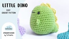 a crocheted stuffed fish next to an ornament with the word little dino on it