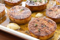 some food is sitting on a pan and ready to be cooked in the oven,