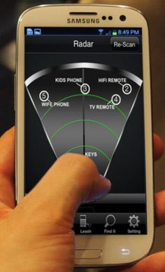 a person holding a smart phone in their hand with radar on it's screen