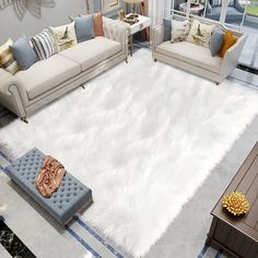 a living room filled with lots of furniture and white fur on top of a rug