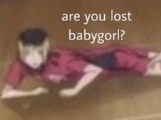 an image of a man laying on the ground with words above him that say, are you lost babygrid?