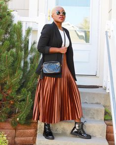 Maxi Skirt Boots Outfit Fall, Long Skirt Combat Boots Outfit, Boots With Pleated Skirt, Pleated Skirt Combat Boots, Pleated Skirt Outfit With Boots, Skirts With Combat Boots, Skirt Combat Boots Outfit, Kenya Outfits, Skirt And Combat Boots Outfit