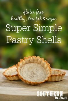 some pie crusts sitting on top of a cutting board with the words super simple pastry shells