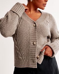 Easy-fitting cardigan in our thick soft sweater yarn fabric, featuring mixed cable and seed stitching details throughout, faux horn buttons and turnback cuffs. Pairs perfect with your favorite pair of jeans! Cable Cardigan, Seed Stitch, Stitching Details, Soft Sweater, Softest Sweater, Women's Tops, Cardigans For Women, Stitch Fix, Abercrombie Fitch