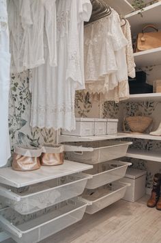 an organized closet with shoes and other items