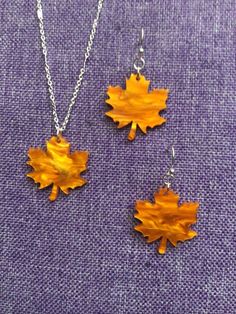 (11,425) Maple Leaf Necklace or Earrings  Made from marbled resin, 1" x 7/8" Earrings on silver plate ear wires  Necklace on 18" sterling silver chain  These really are very beautiful! Leaf-shaped Jewelry With Matching Earrings, Leaf-shaped Jewelry With Matching Earrings For Gift, Leaf-shaped Jewelry Gift, Elegant Nickel-free Resin Jewelry, Yellow Resin Jewelry With Matching Earrings, Elegant Orange Resin Jewelry, Orange Hypoallergenic Sterling Silver Jewelry, Hypoallergenic Orange Sterling Silver Jewelry, Soldered Amber Jewelry Gift