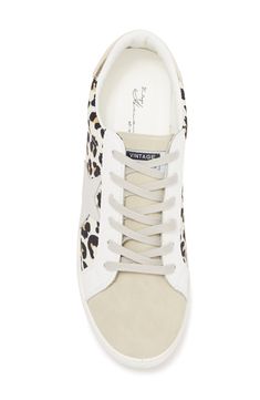 A sporty sneaker features a star logo and eye-catching panels for chic style. 1" platform Round toe Lace-up vamp Synthetic upper, lining, manmade sole Imported Sporty Sneakers, Star Logo, Vintage Havana, Vans Old Skool Sneaker, Golden Goose Sneaker, Havana, Vans Sneaker, Size 13, Vintage Shops