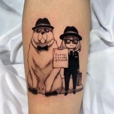 a couple of bears that are next to each other on a person's leg