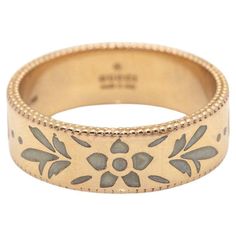 GUCCI Italian design ring, Icon Blossom collection in gold and enamel for women. Adorned with the GG motif, the distinctive signature emblem of the brand : 18kt Rose Gold : 5,59 grams : Measures : Width 6mm : Size 14, this ring cannot be resized : Brand new product : Ref: D360460FJ Vintage Gold Gucci Jewelry, Vintage Gucci Gold Jewelry, Rose Gold Enamel Ring, Gucci Gold Fine Jewelry Rings, Gold Enamel Ring With Inlay, Gucci Rose Gold Jewelry Gift, Gucci Rose Gold Jewelry For Gift, Designer Black Enamel Rings For Gift, Gucci Gold Rings For Anniversary