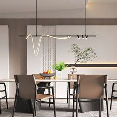 a dining room table with chairs and a bowl of fruit on top of the table