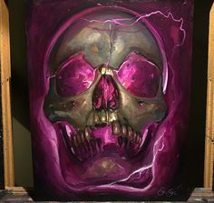 a painting of a skull in purple and gold