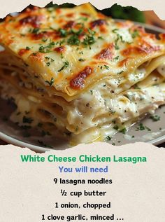 a white plate topped with lasagna covered in cheese